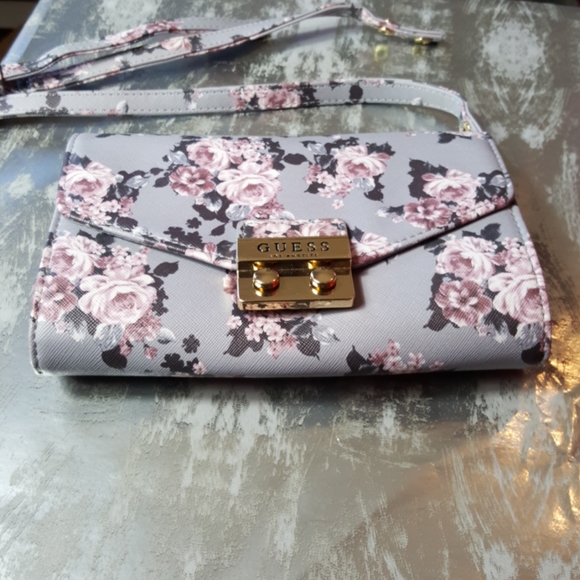 Guess Handbags - GUESS purple floral clutch/crossbody